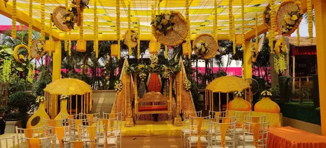 Kalinga Events - Haldi ceremony stage setup with colorful backdrop, wedding planner Sambalpur